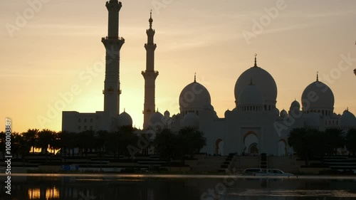 Sunset stunning view of Sheikh Zayed Mosque in Abu Dhabi. Grand architecture, serene atmosphere make it remarkable symbol of Islamic culture and spirituality in UAE. view from Wahat Al Karama photo