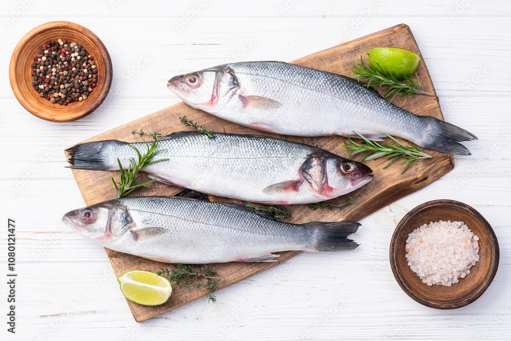 Raw sea bass fish photography . Top view Raw sea bass fish photography . Top view
