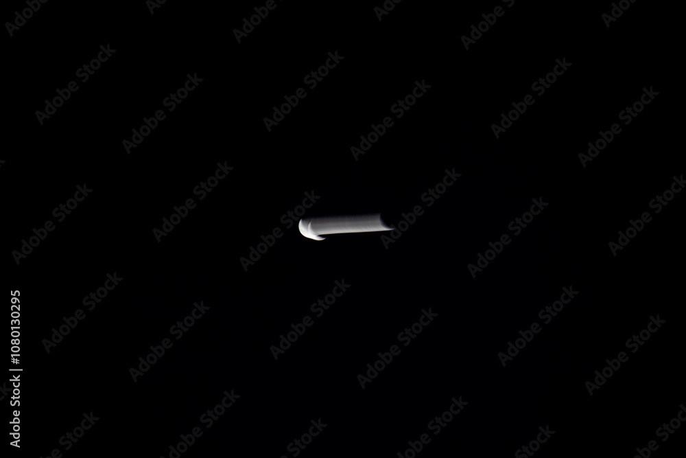 Blurred crescent moon in dark sky Blurred crescent moon in dark sky