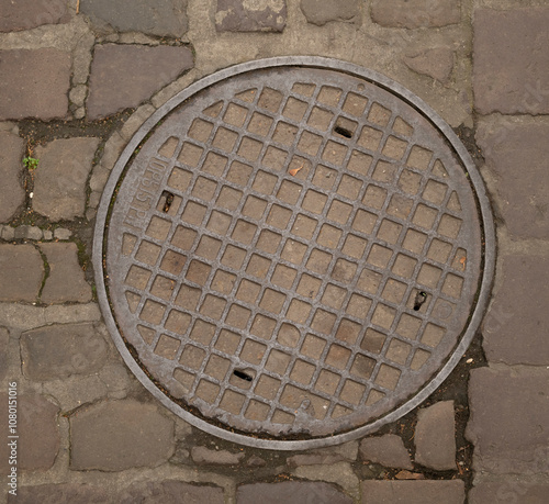 manhole cover in the street	
