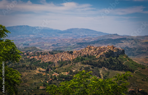 Picturesque panoramic aerial view of Enna old town, Sicily, Italy. Enna is a city and comune located at the center of Sicily. At 931m above sea level, Enna is the highest Italian provincial capital