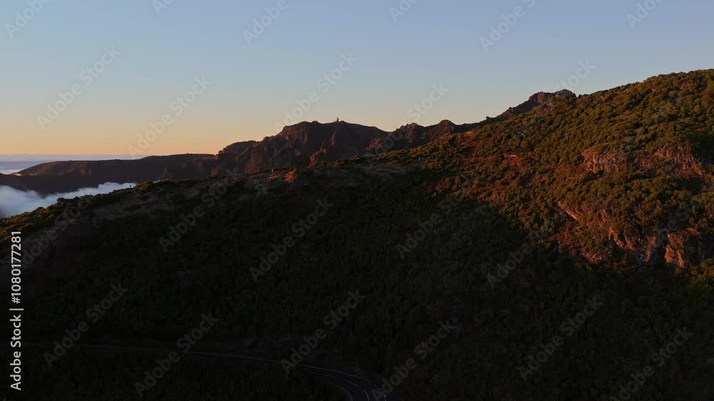 Scenic Mountain Landscape at Sunrise with Cloudy Horizon Scenic Mountain Landscape at Sunrise with Cloudy Horizon