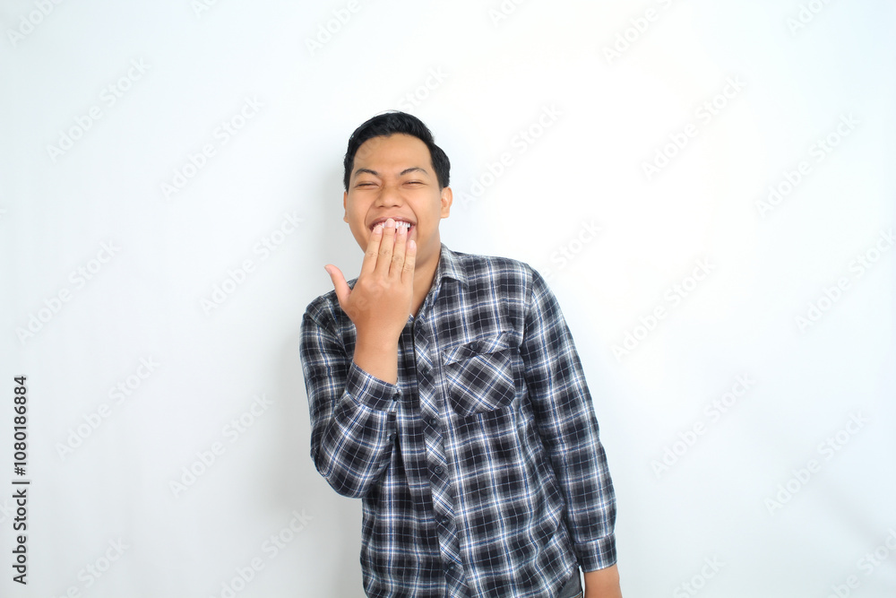 joyful asian man laughing and covering mouth isolated white background, wearing casual shirt, male feeling cheerful joyful asian man laughing and covering mouth isolated white background, wearing casual shirt, male feeling cheerful
