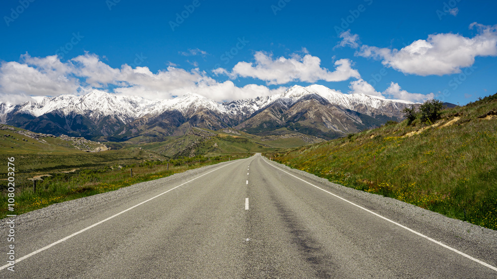 Empty road toward the mountains, New Zealand Empty road toward the mountains, New Zealand
