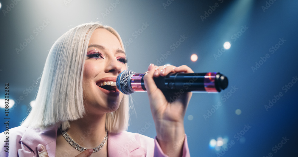 Pop Concert with a Romantic Atmosphere: Young Talented Female Musician Performing a Live Concert. Creative Cinematic Footage with a Beautiful Singer Dancing and Singing on Stage Pop Concert with a Romantic Atmosphere: Young Talented Female Musician Performing a Live Concert. Creative Cinematic Footage with a Beautiful Singer Dancing and Singing on Stage