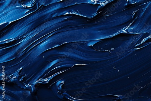 Beautiful abstract background of blue water with waves and splashes