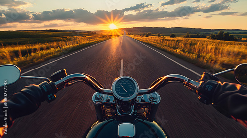 A Harley-Davidson motorcycle cruising down Route 66 at dusk with the open road ahead.