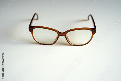 Close-up of brown new glasses against white background. Photo taken November 14th, 2024, Zurich, Switzerland.