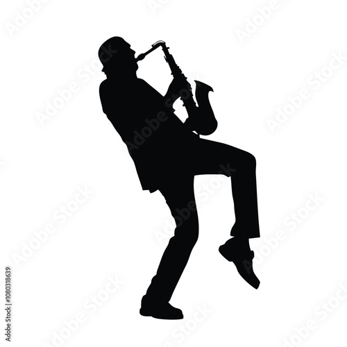 A man playing a saxophone. He is wearing a hat and is bending over. The saxophone is in his right hand