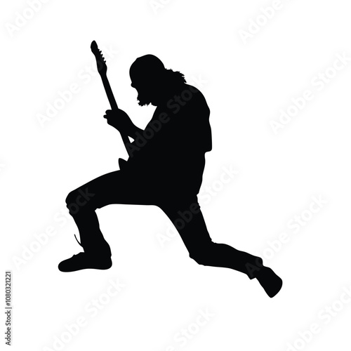 A man is playing a guitar. He is running. The guitar is black. The man is wearing black pants