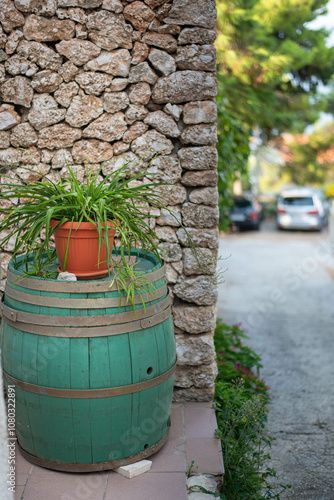 Narrow streets of the village of Stanici, Croatia. The charming, winding alleys are lined with traditional stone houses, offering a glimpse of authentic Mediterranean life. photo