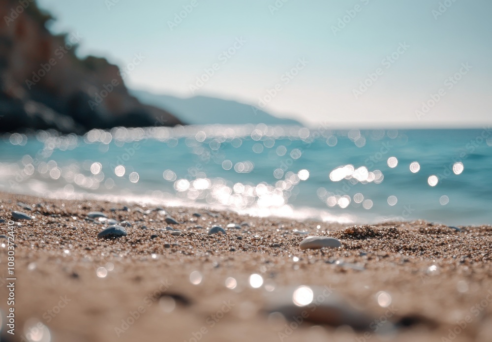 Beautiful Sandy Beach with Blue Sea and Bokeh Effect Beautiful Sandy Beach with Blue Sea and Bokeh Effect