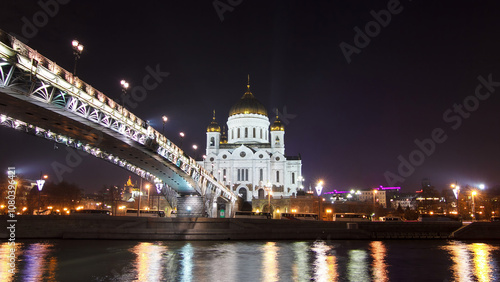 Majestic orthodox Cathedral of Christ Saviour and bridge at dusk on bank of Moscow river. Timelapse hyperlapse, Russia