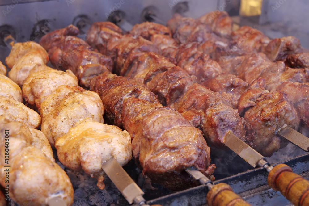 Kebabs on skewers are grilled on hot coals Kebabs on skewers are grilled on hot coals