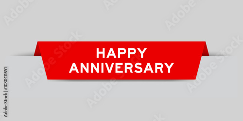 Red color inserted label with word happy anniversary on gray background