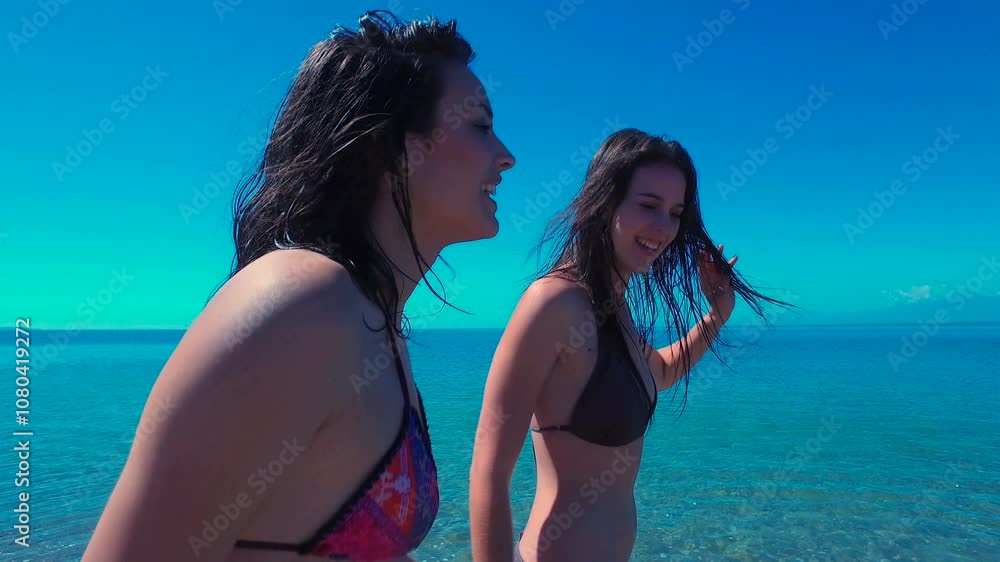 Girl friends having fun at the beach, summer Girl friends having fun at the beach, summer