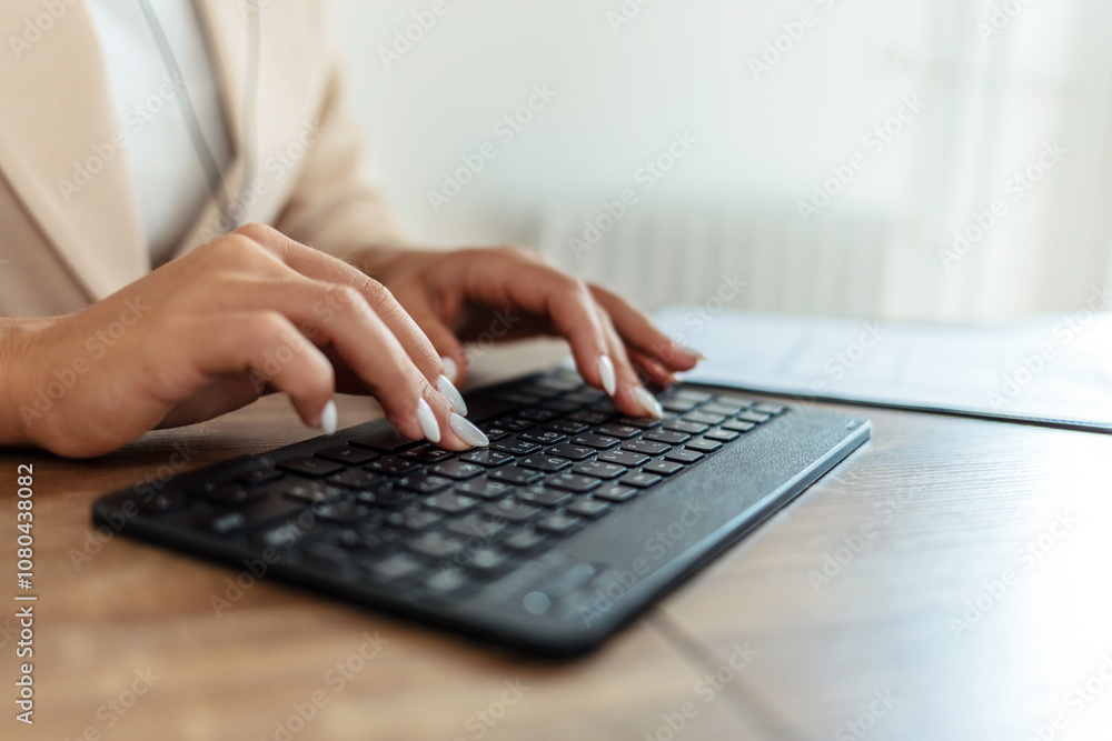 Keyboard, hands and businesswoman in the office typing for legal research for a court case. Technology, career and closeup of professional female attorney working on a law project in modern workplace. Keyboard, hands and businesswoman in the office typing for legal research for a court case. Technology, career and closeup of professional female attorney working on a law project in modern workplace.