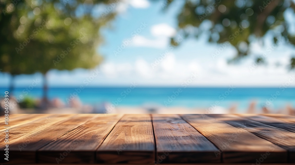 An empty wooden table with background of tropical beach and blue sky An empty wooden table with background of tropical beach and blue sky
