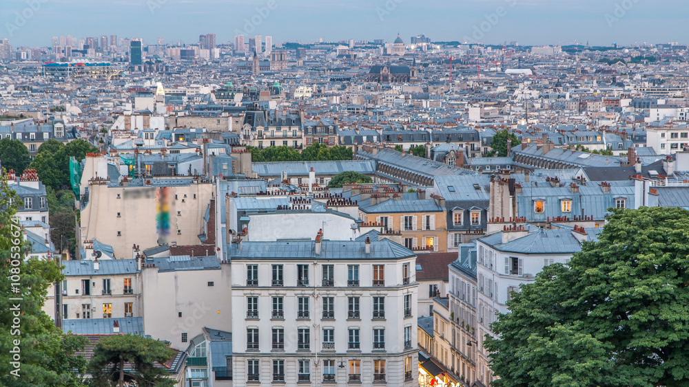 Fototapeta premium Beautiful Paris cityscape day to night timelapse seen from Montmartre. Paris, France