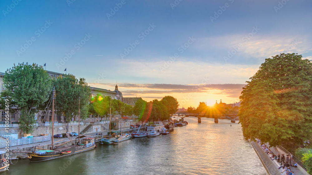 Fototapeta premium View to Pont des Arts in Paris at sunset timelapse, France