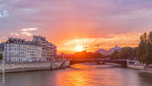 Wallpaper Mural Le Pont D'Arcole bridge at sunset with people and boats timelapse, Paris, France, Europe Torontodigital.ca