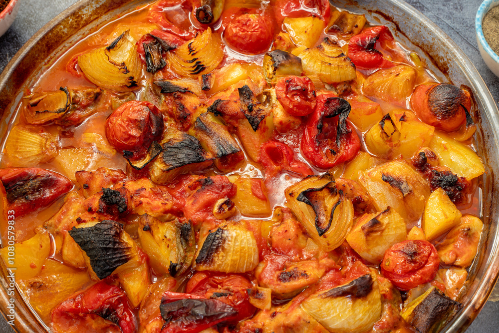 Traditional delicious Turkish dishes; potato, tomato, pepper, garlic and meat dish (Turkish name; Fırında tas kebabı,)
