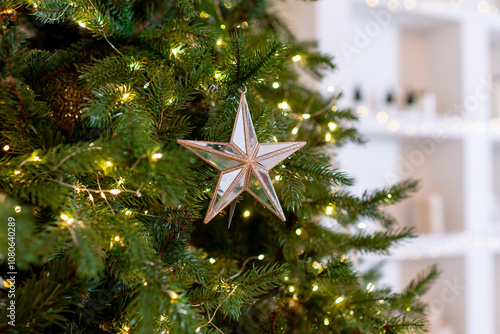 Christmas decorations. Christmas tree in the bright living room.