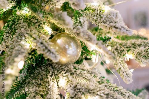 Christmas decorations. A shiny ball on a Christmas tree