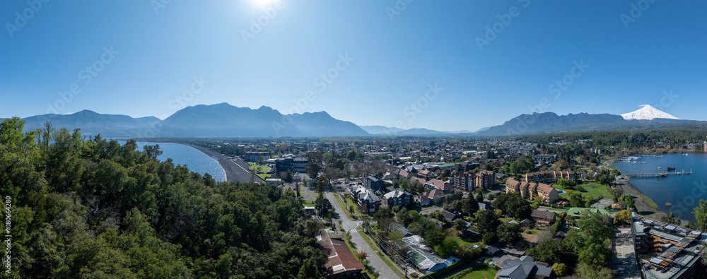 Fototapeta premium Pucon city aerial panoramic view of a sunny summer day. Araucania, Chile