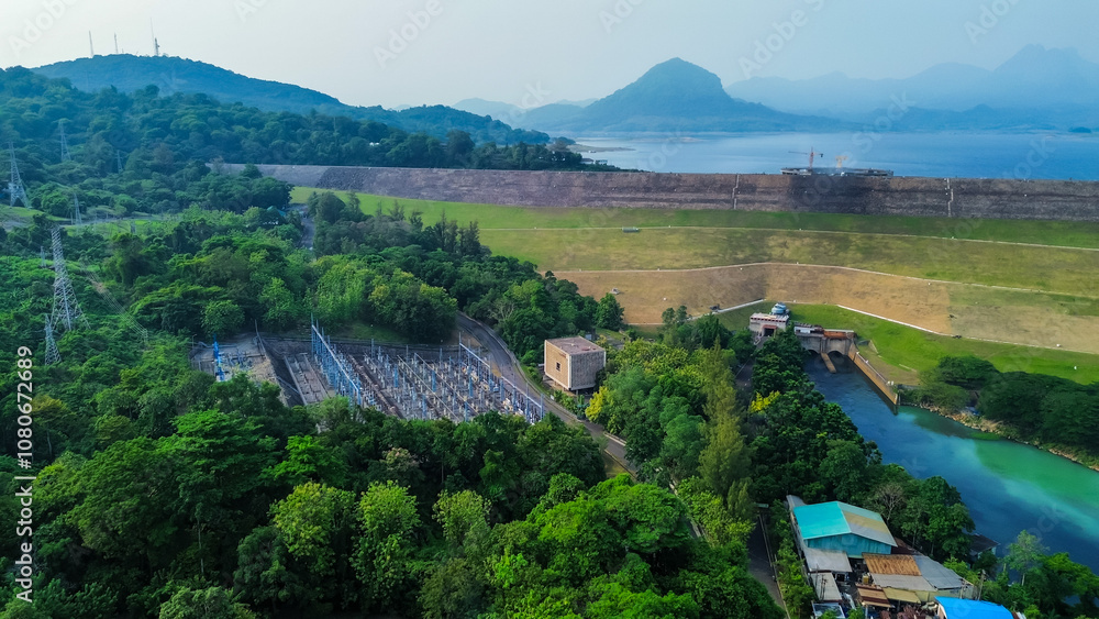 Obraz premium Aerial View of Jatiluhur, the Largest Dam in Indonesia. Bendungan Jatiluhur of Purwakarta. Multi-Purpose Embankment Dam on The Citarum River with Morning Glory Spillway