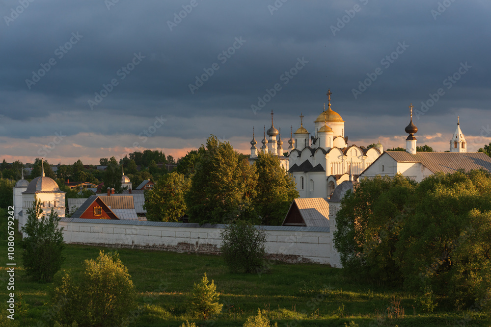 Fototapeta premium Panoramic view of the Pokrovsky Monastery in Suzdal at sunset. Russia. Summer landscape. High quality photo