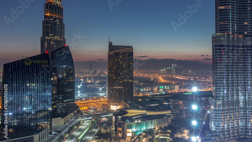 Canvas Print Dubai downtown street with busy traffic and skyscrapers around timelapse