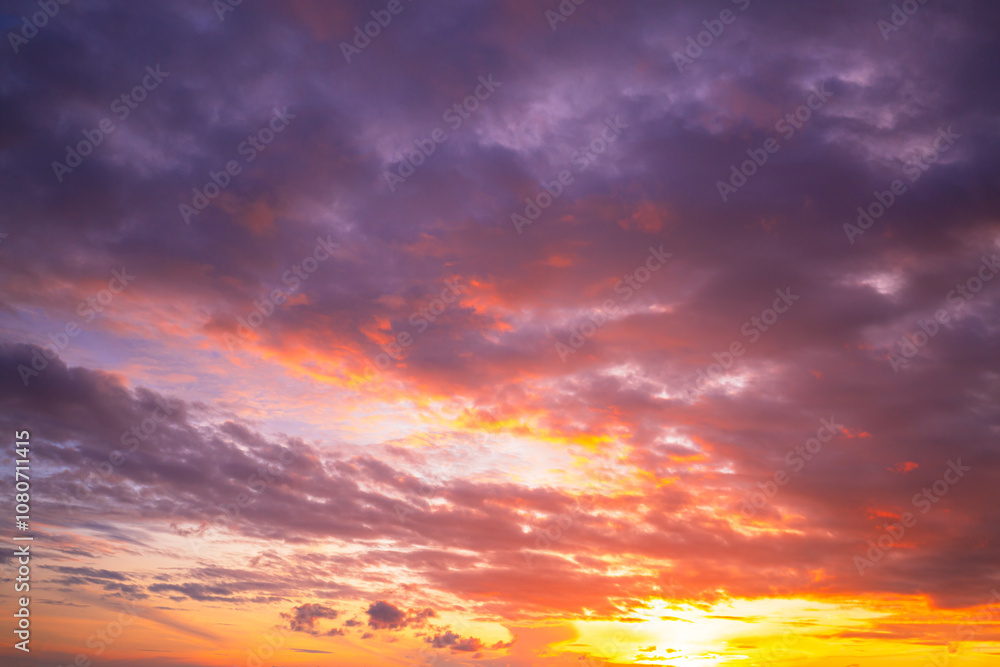 Fototapeta premium Morning cloud and sky background,Real majestic sunrise sundown sky background with gentle colorful clouds without birds. Panoramic, big size,Beautiful Vivid sky painted by the sun leaving bright golde