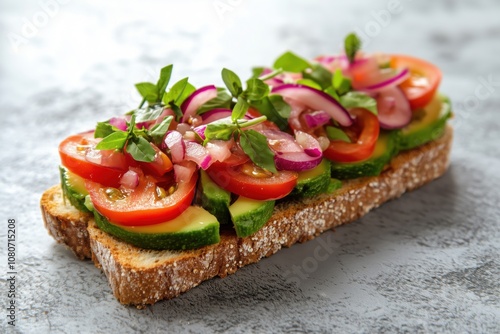 Fresh vegetable sandwich with tomatoes, cucumbers, onions, herbs