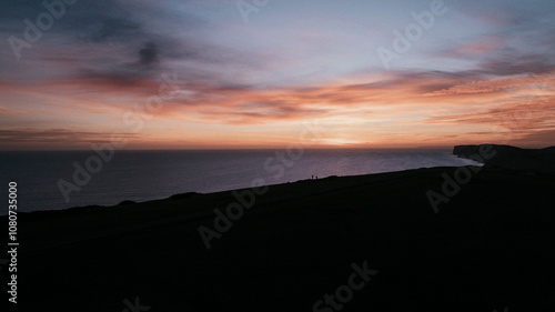 Evening view of the sea and an island in the dark and only the sky is shining