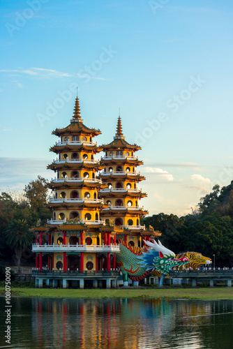 Принти на полотні Twin Dragon and Tiger Pagodas at Lotus Pond on a beautiful evening in Kaohsiung,