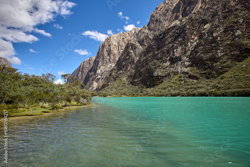 Crystal-clear waters cradled by towering Andean peaks. Llanganuco Lagoon is a masterpiece of nature’s serenity – Cordillera Blanca Ancash Peru photo