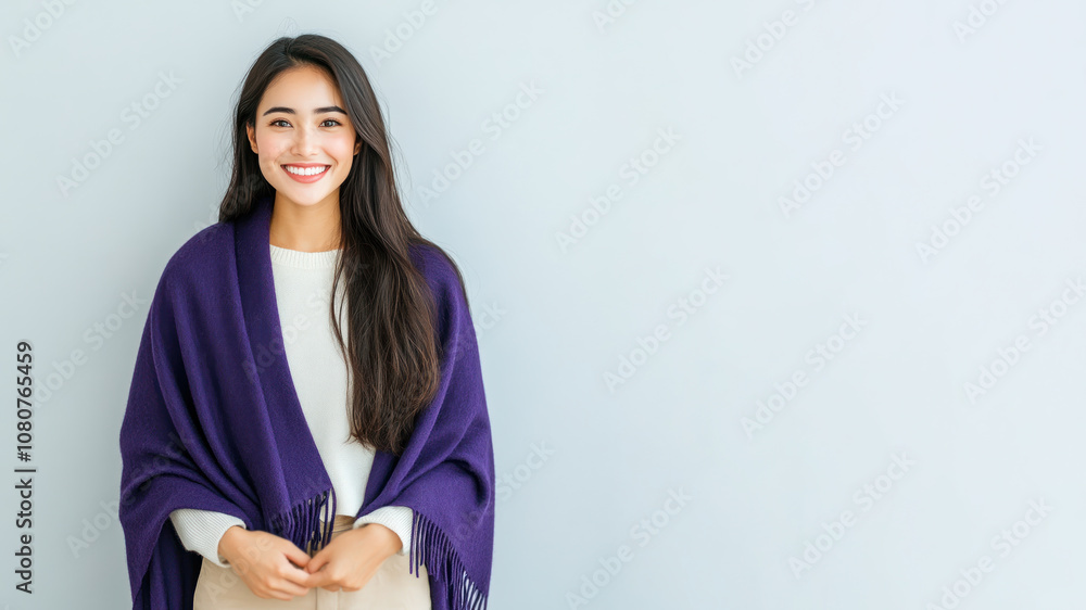 Malay woman wearing traditional cloak wool poncho isolated on gray Malay woman wearing traditional cloak wool poncho isolated on gray