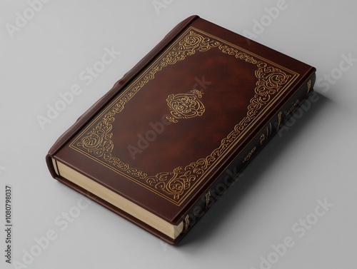 A vintage leather-bound book with gold embellishments and a closed cover on a white background.