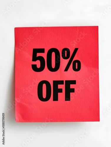 Black '50% OFF' Text on a Red Square Paper Note. White Background 