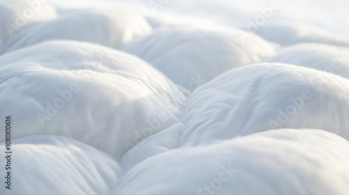 Close up of a thick pure white quilt with no labels during winter