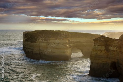 Offshore arch of Mutton Bird Island from Loch Ard Gorge in the Twelve Apostles Marine National Park along the Great Ocean Road in Victoria, Australia photo