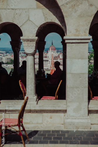 Canvas Print Silhouette of a  person at a cafe/restaurant at the Fishermen's Bastion in Budap