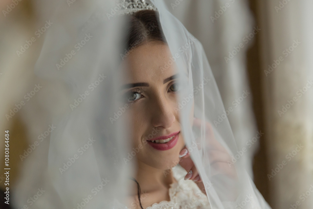 A woman is wearing a veil and smiling. She is looking at the camera. The image has a soft and romantic mood A woman is wearing a veil and smiling. She is looking at the camera. The image has a soft and romantic mood