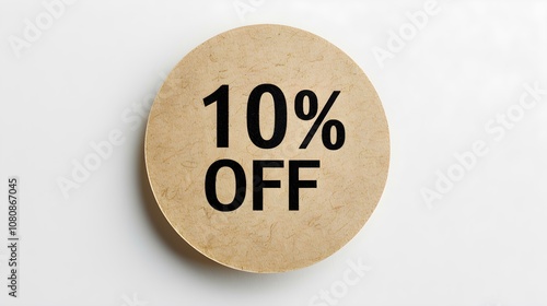 Black '10% OFF' Text on a Light Brown Round Paper Note. White Background with Copy Space