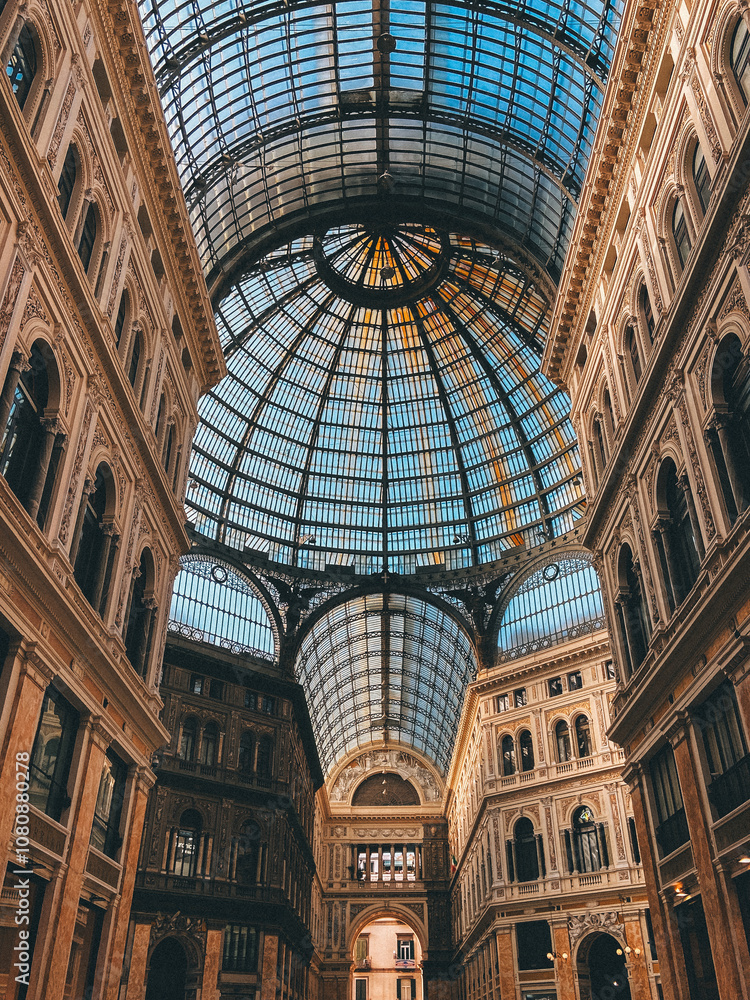 Fototapeta premium Elegant Historic Arcade with Grand Glass Dome and Ornate Architecture