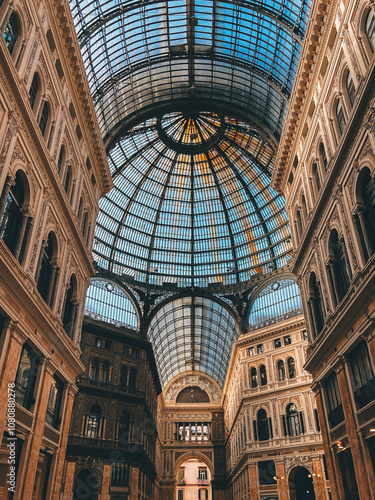 Elegant Historic Arcade with Grand Glass Dome and Ornate Architecture