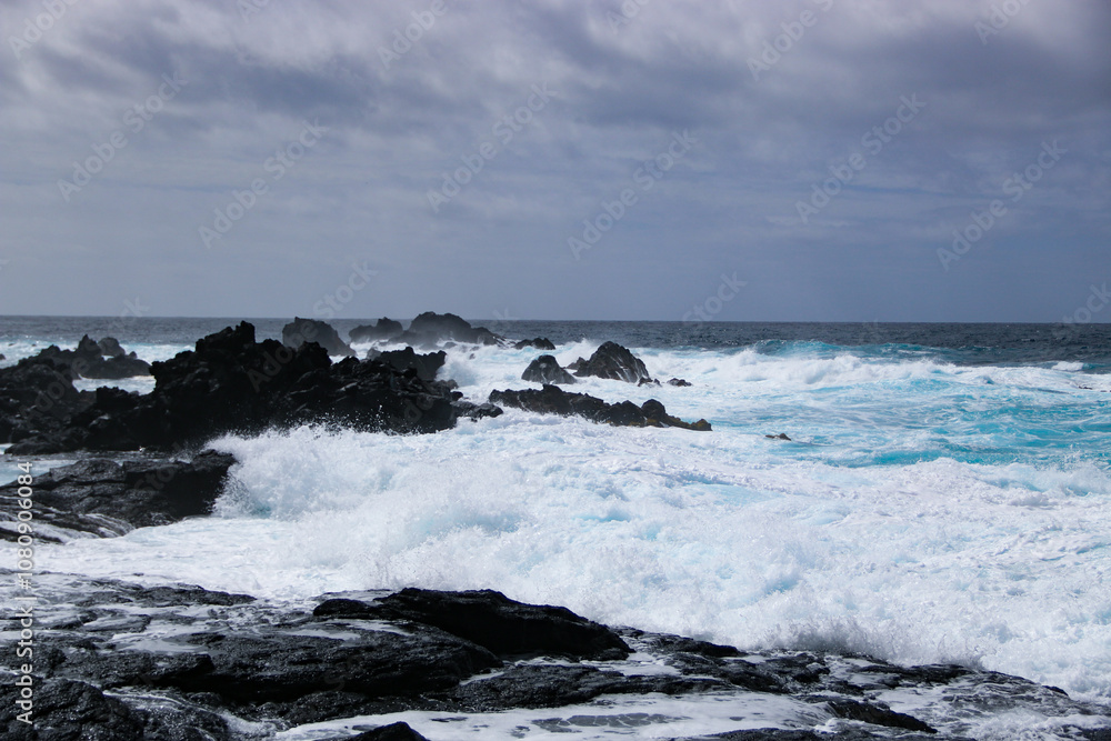 waves crashing on rocks