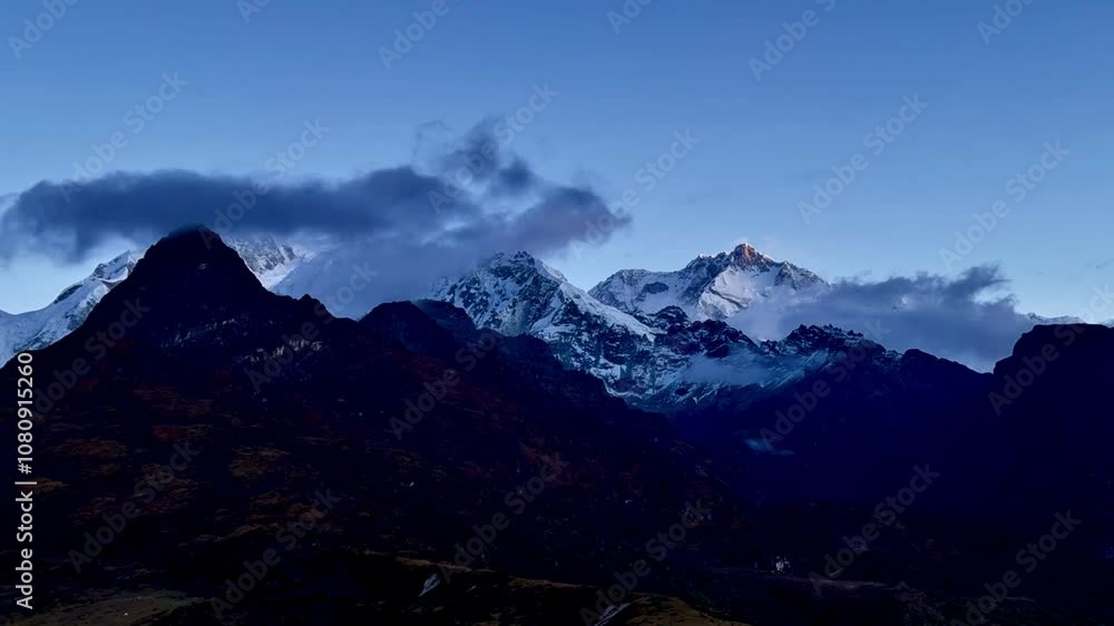Sunrise Timelapse of Mount.Kanchanjunga visible from Dzonri Top Sunrise Timelapse of Mount.Kanchanjunga visible from Dzonri Top