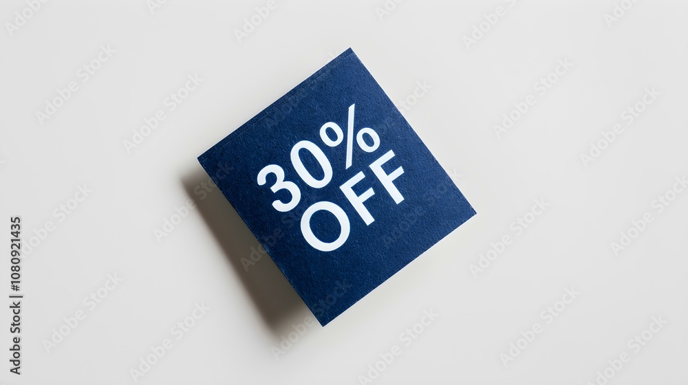 White '30% OFF' Text on a Navy Blue Square Paper Note. White Background with Copy Space White '30% OFF' Text on a Navy Blue Square Paper Note. White Background with Copy Space